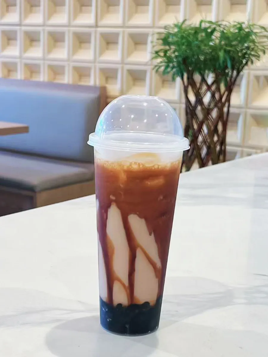 Brown sugar milk tea with boba toppings at Mochi & Crunch Treats, a Modern Dessert Café in Tupelo