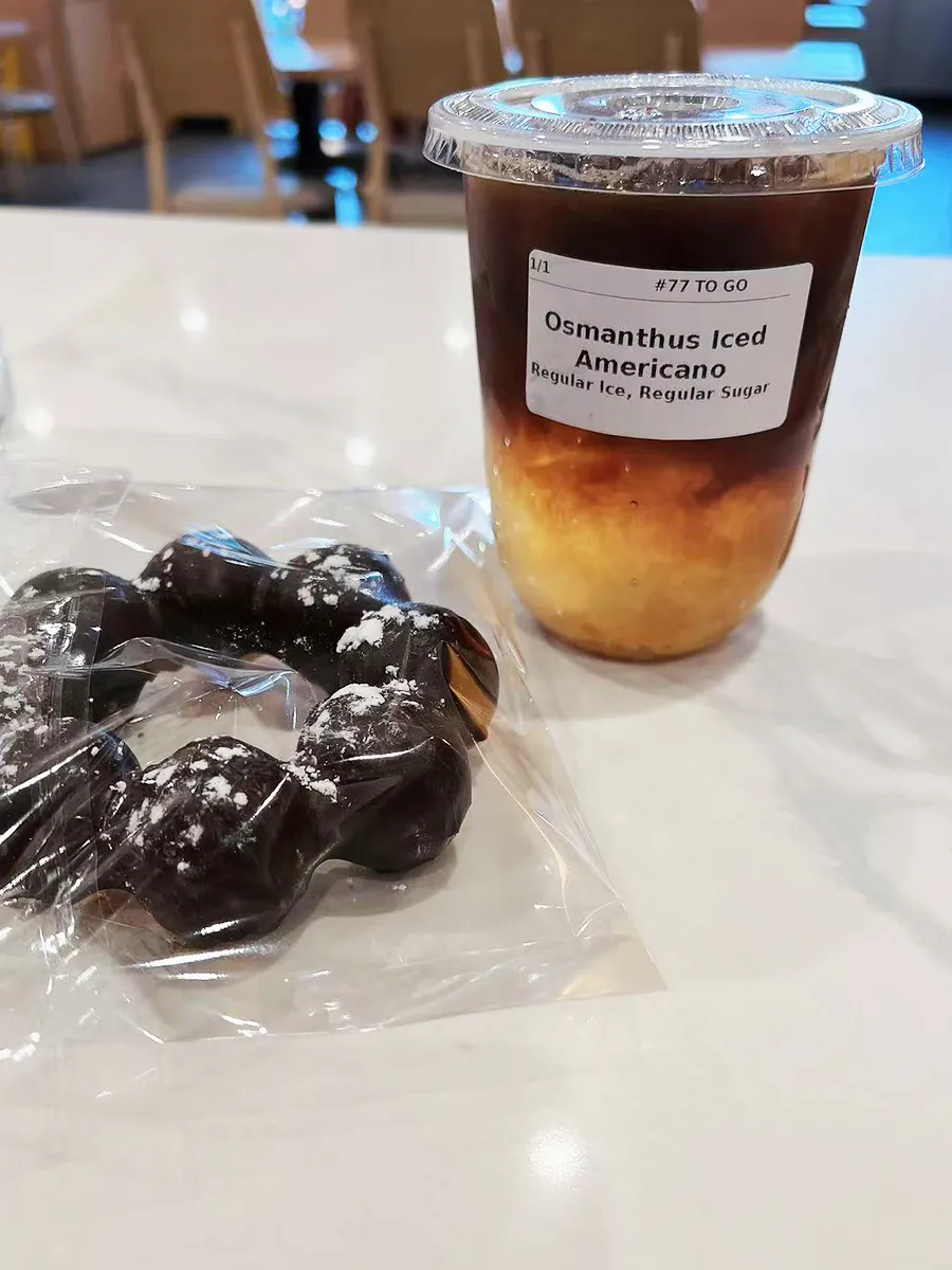 Osmanthus iced Americano paired with chocolate mochi donut at Mochi & Crunch Treats, a Modern Dessert Café in Tupelo