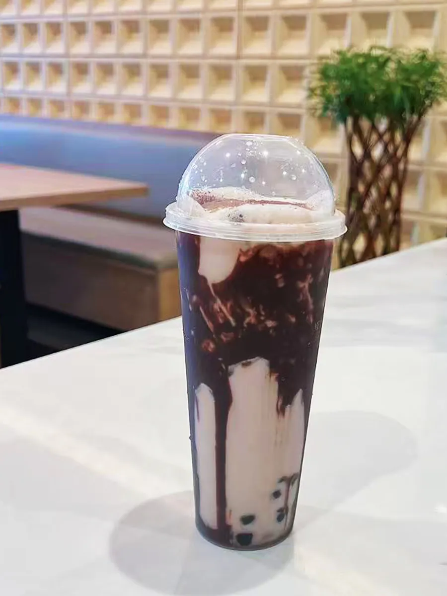 Rich chocolate milk tea with boba pearls at Mochi & Crunch Treats, a Modern Dessert Café in Tupelo