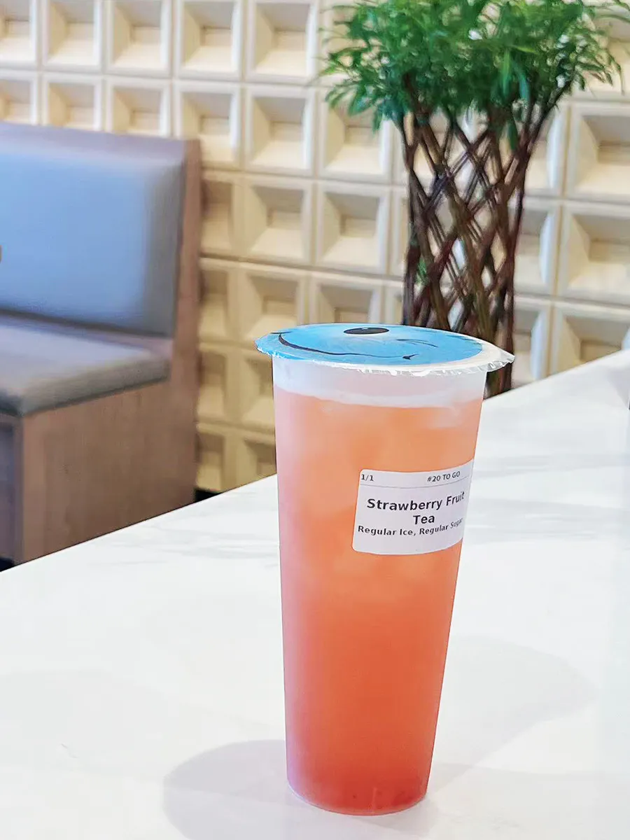 Refreshing strawberry fruit tea with icy texture at Mochi & Crunch Treats, a Modern Dessert Café in Tupelo